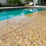 Swimming Pool Decking With Natural Stones & Pebbles